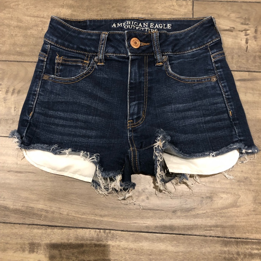 Dark wash raw hem shorts